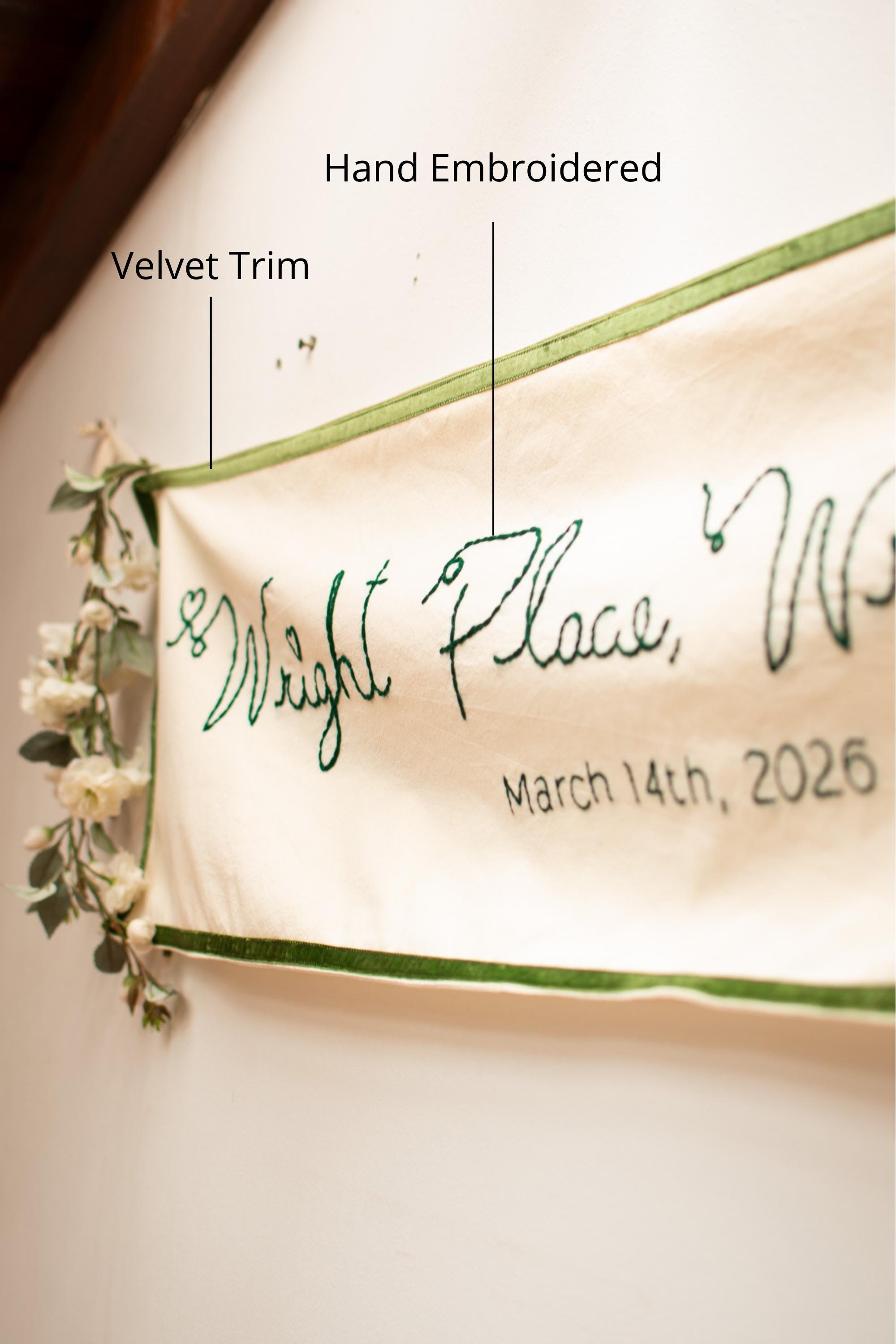 Hand embroidered banner with 'Wight Place' and date, featuring velvet trim and floral elements.