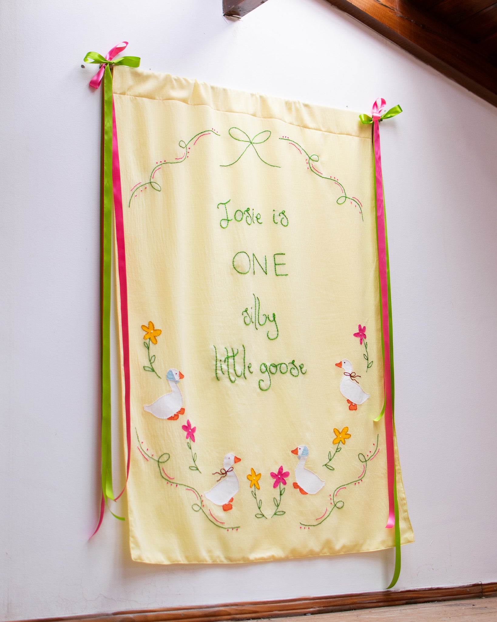 Hand Embroidered First Birthday Banner | Custom Name Goose & Floral Backdrop